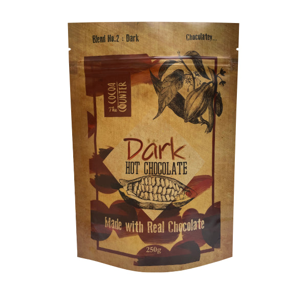 Package of dark hot chocolate with cocoa bean illustration on a white background